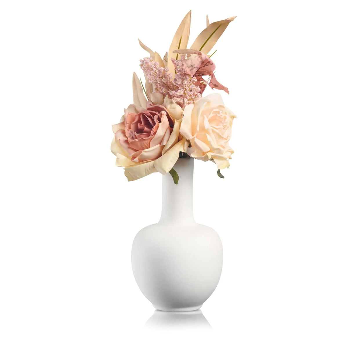 White ceramic vase with pink and peach faux roses and greenery arrangement, ideal for home decor or gifting.