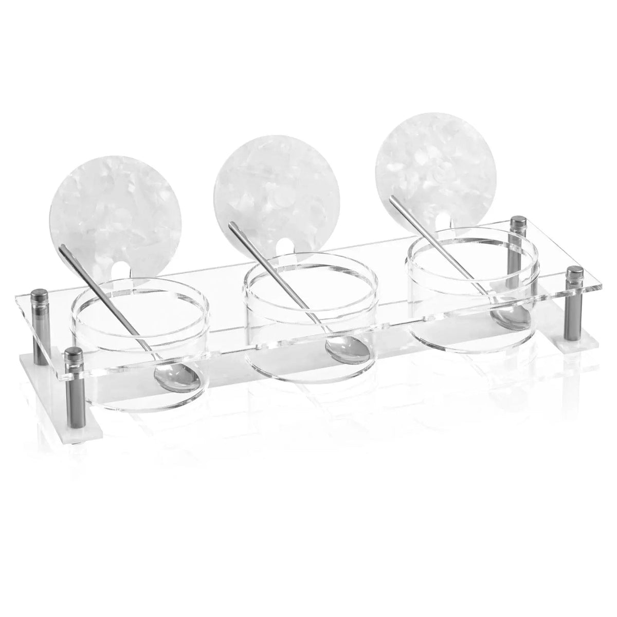 Three suspended pearlstone dip bowls with stainless steel stands and serving spoons, elegant marble serveware for entertaining and special occasions.