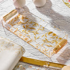 Waterdale Collection floral bird bread tray with gold accents displayed on white tablecloth, featuring delicate botanical design perfect for serveware and Shabbat entertaining.