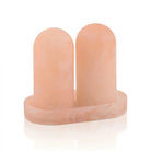 Peach resin salt shaker set with matching tray, featuring two cylindrical shakers on a rectangular base from Waterdale Collection.