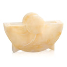 Cream-colored round resin napkin holder with curved sides and spherical finial, ideal for Pesach tabletop settings.