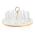 Classic Pearlstone liquor set featuring clear glass bottles and cups arranged on a pearl marble base with gold accents and decorative holder.
