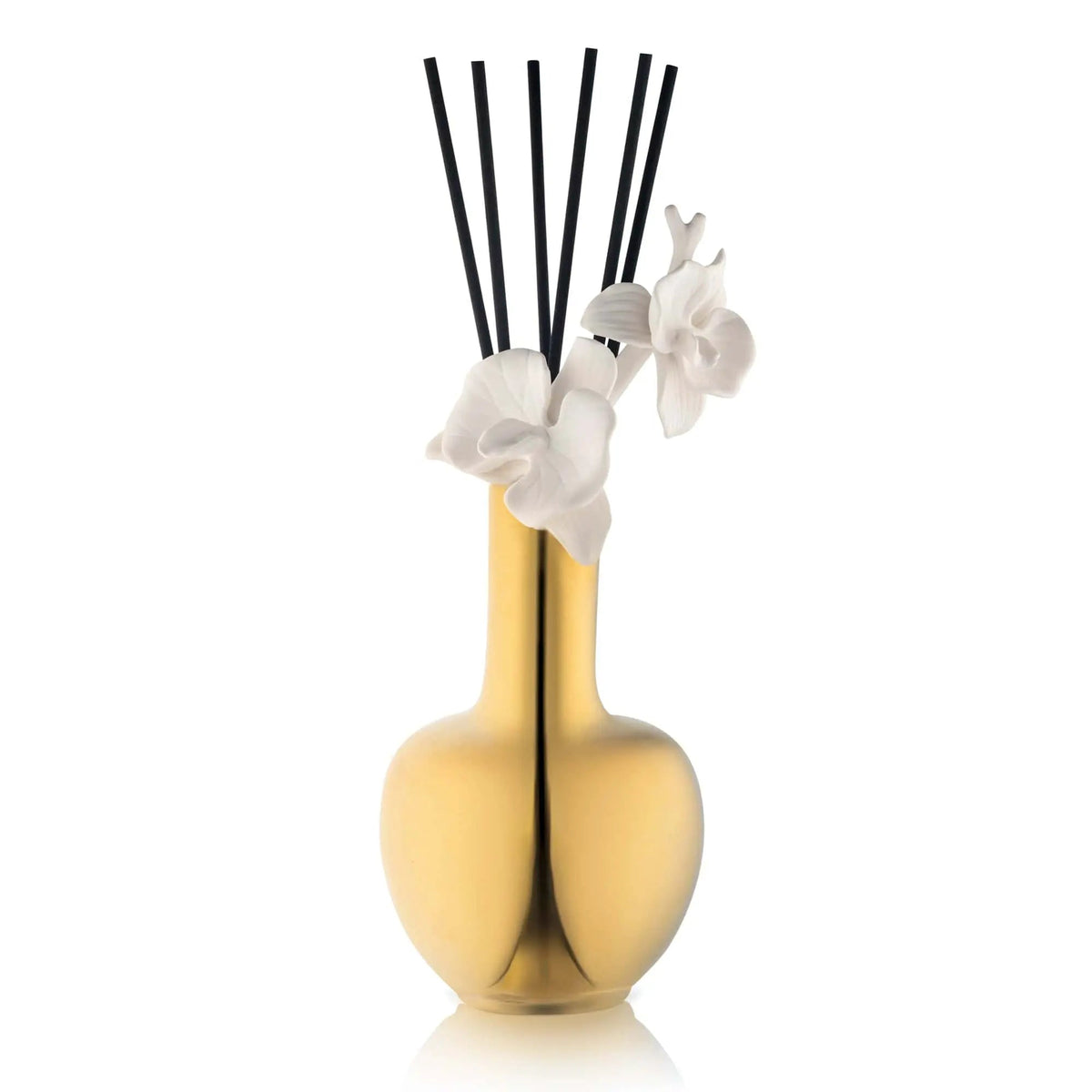 Gold orchid-shaped vase diffuser with black reed sticks and white flower accents by Waterdale Collection