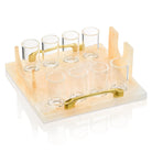 Cream resin liquor and wine serving set with multiple glasses and matching bottle holder on white base, by Waterdale Collection