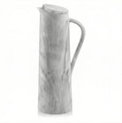 Waterdale Collection resin pitcher in white marble pattern with curved handle and tapered spout design for serving beverages.