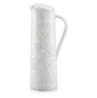 White resin pitcher with textured twig pattern design, featuring a handle and pouring spout, ideal for table service.