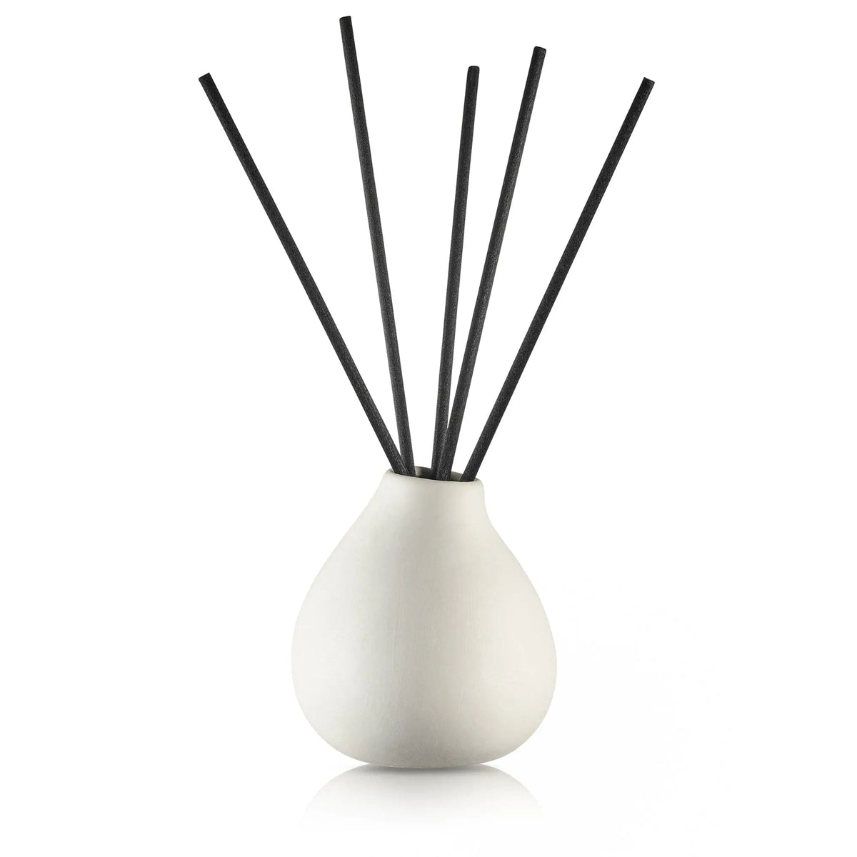 White teardrop reed diffuser with black reeds in frosted ceramic base by Waterdale Collection, modern home fragrance décor