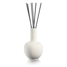 White ceramic Aura Vase Diffuser with black reed sticks, modern minimalist design for home fragrance and décor.